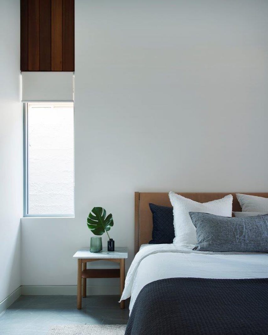 Magnolia Residence: A simple palette of carefully detailed whitewashed walls, concrete, timber, linen and the careful placement of windows for natural lighting results in a wonderful tranquil space for rest and contemplation…. Architecture @chindarsiarchitects Interiors @janeledgerinteriors. Photography @jody_darcy